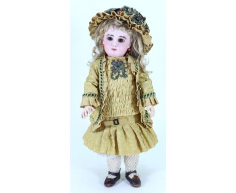 A beautiful Bebe ‘Mascotte’ May Freres bisque head doll, French 1895, with lovely pale complexion, fixed brown glass paper-we