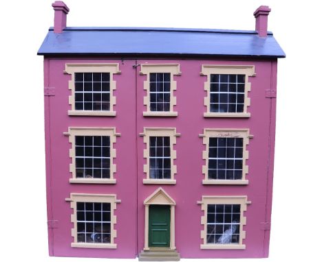 A large painted wooden dolls house and contents, English 1890s, the painted brick red exterior with three steps leading to gr