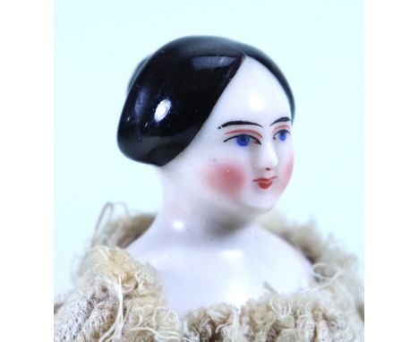 Rare small glazed china shoulder head doll on wooden jointed body, German circa 1845, with finely painted features, black mou