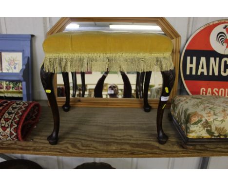A mahogany and upholstered button down dressing stool 
