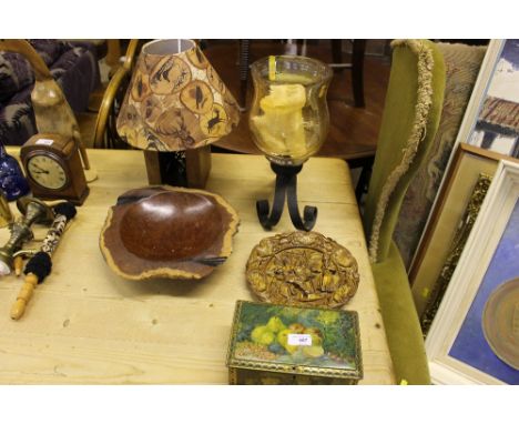 A wrought iron candle stand; a turned wooden bowl; a tin; a table lamp and shade etc.