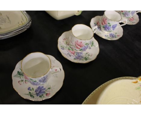 A set of six each Royal Albert Friendship "Sweet Pea" coffee cups and saucers; together with two Paragon tea cups and saucers