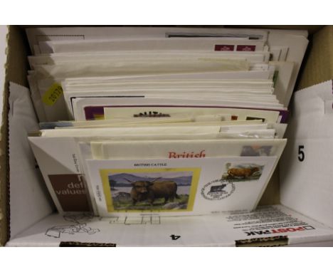 A box and an album of First Day covers