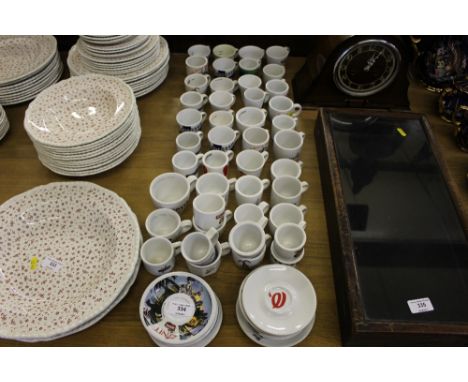 A quantity of various coffee cups and saucers 