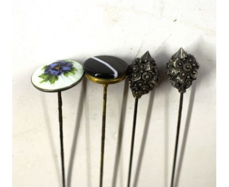 Four various stick pins to include a silver and enamel example 