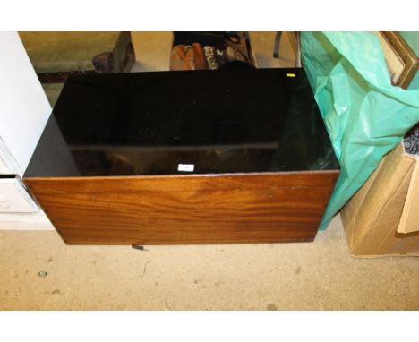 A mahogany Campaign trunk with carrying handles 