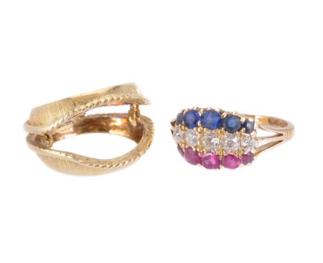 An early 20th century ruby, diamond and sapphire ring, the central row of old brilliant cut diamonds, approximately 0.30 cara