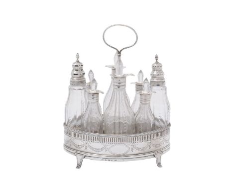 A George III silver oval cruet stand by William Abdy I, London 1788, with a central threaded loop handle on a tapered stem, c