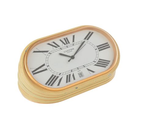 Must De Cartier, Ref. 7531 01011, a faux ivory cased table clock, quartz movement, white dial, Roman numerals, sword hands, d