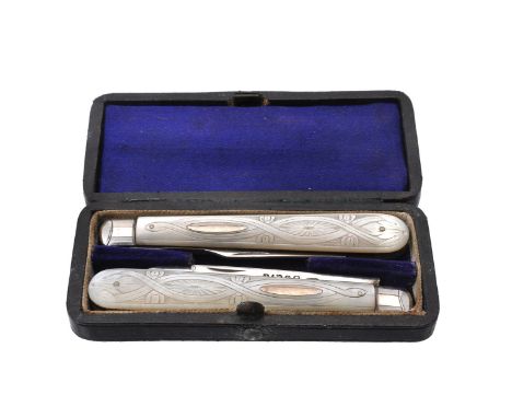 A Victorian silver and mother of pearl travelling fruit knife and fork, maker's mark JL (unrecorded), Sheffield 1874, with va