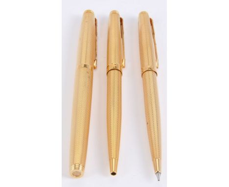 Parker, 75 Grain D'Orge, a gold plated fountain pen, ball point pen and propelling pencil, the fountain pen cap with arrow cl