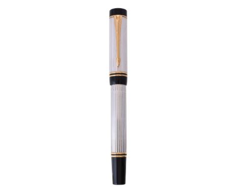 Parker, Duofold International, a silver plated fountain pen, the cap with gilt arrow clip and double cap band, the nib stampe