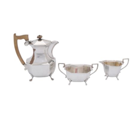 A silver canted rectangular hot water pot, cream jug and sugar basin by Viners, Sheffield 1938, the hot water pot with a comp