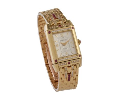 Jaeger LeCoultre, Reverso, Ref. 265.1.86, Lady's 18 carat gold, ruby and diamond bracelet watch, no. 1807964   Movement: Manu