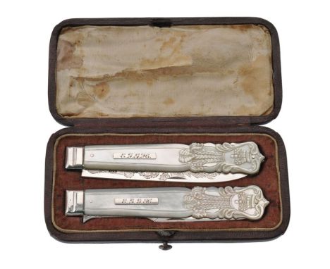 A Victorian silver and mother of pearl travelling fruit knife and fork by Aaron Hadfield, Sheffield 1865, with rectangular re