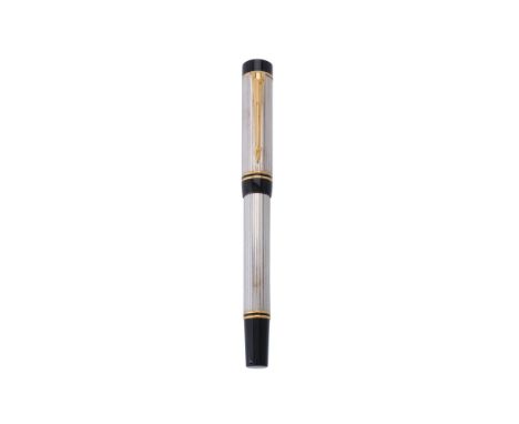 Parker, Duofold International, a silver plated fountain pen, the cap with gilt arrow clip and double cap band, the medium nib