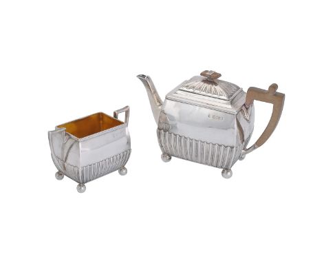 A Victorian silver swollen rectangular tea pot and sugar basin by Horace Woodward &amp; Co., London 1889, PODR mark for 20th 