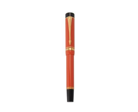 Parker, Duofold Centennial, an orange fountain pen, the cap with gilt arrow clip and double cap band, the fine nib stamped 18