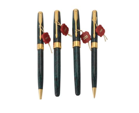 Parker, Sonnet A, a green laque marbled fountain pen, roller ball pen, ball point pen and propelling pencil, the fountain pen