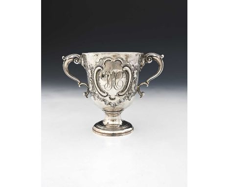 Ireland, an eighteenth-century Irish silver two-handled cup, the body initialled "PRC", and decorated with flowers, Rococo sh