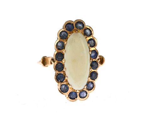 An early 20th century gold opal cabochon and sapphire cluster ring, with grooved band, ring size L1/2, 4.2g