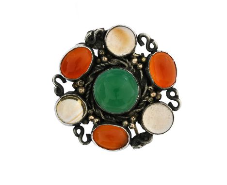 Sibyl Dunlop (attributed), an Arts and Crafts silver and gem set brooch, ciruclar form, the central chrysoprase cabochon with