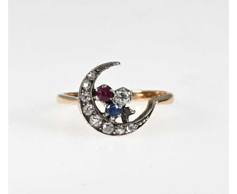 A late Victorian 18ct gold and silver old-cut diamond, ruby and sapphire crescent ring, with tapered shoulders, ring size O1/
