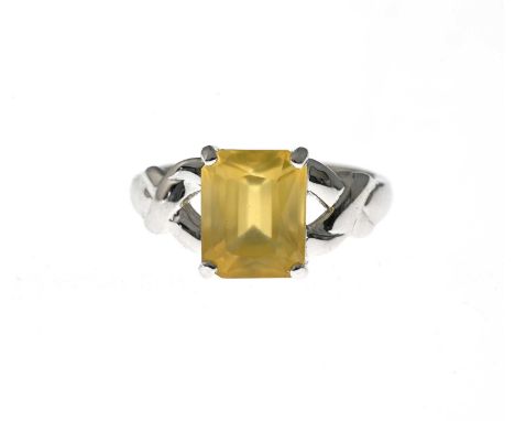An 18ct gold fire opal single-stone ring, opal measures approximately 10 by 8mm, hallmarks for Birmingham 2006, ring size N1/