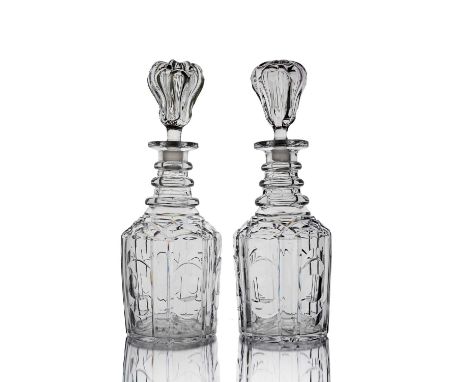 A pair of William IV cut glass decanters, circa 1830, Nelson form, three ring neck with mallet body, lens and crescent cut pa