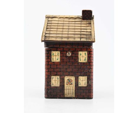 A George III novelty tea caddy, circa 1810, in the form of a double-fronted house, pitched roof with chimney and ivory simula