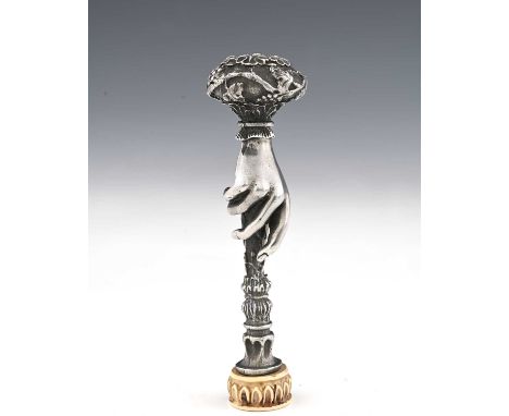 A late 19th Century Continental white metal Art Nouveau hand seal, with ivory intaglio and carved matrix, with coat of arms, 