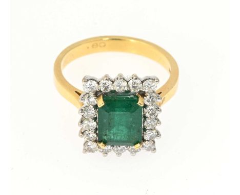 An 18ct gold emerald and brilliant-cut diamond cluster ring, total diamond weight 0.80ct, engraved to band, estimated I-J col