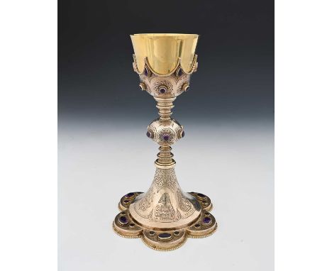 An early twentieth-century Irish eighteen-carat gold and silver chalice, modelled in the Gothic-revival style, with a detacha