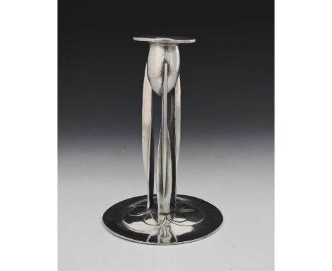 Archibald Knox for Liberty and Co., a Tudric Arts and Crafts pewter candlestick, model 0223, the ovoid sconce with broad rim 