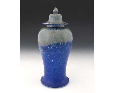 Ruskin Pottery, a Crystalline vase and cover, 1927, temple altar jar form, blue grey shoulder over mottled matte blue ground,