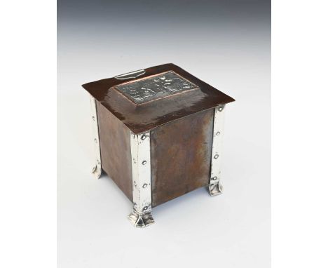 A E Jones, an Arts and Crafts silver and copper tea caddy, circa 1910, cuboid form with riveted strap edges and feet, the pla