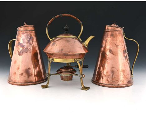 W A S Benson, two Arts and Crafts copper and brass insulated or 'jacketed' jugs, circa 1900, model 782, conical form with hin