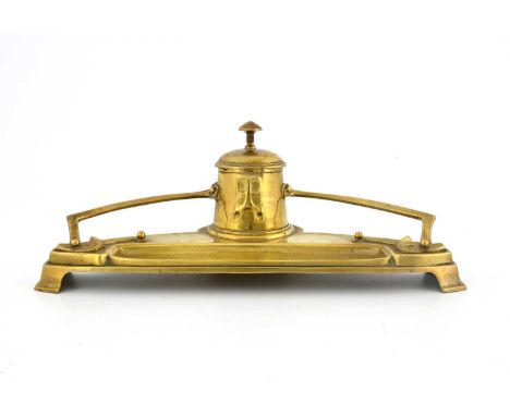 A Jugendstil gilt brass desk stand inkwell, circa 1900, in the style of Kayserzinn, the conical inkwell with organic relief e