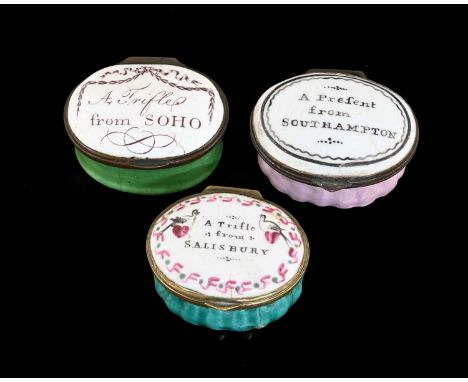 Three Bilston enamel patch boxes, circa 1790, each with inscriptions to the oval lids, A Trifle from Salisbury, A Trifle from