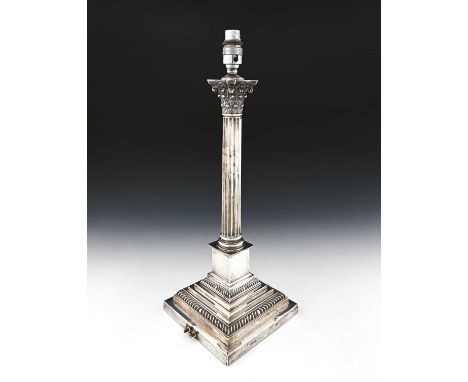 A George V silver Corinthian column lamp base, of generous proportions, with presentation inscription "Their Excellencies, fr