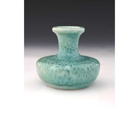 Ruskin Pottery, a High Fired vase, 1908, squat bulbous form with flared neck, turquoise with green oxide speckles, 10cm high