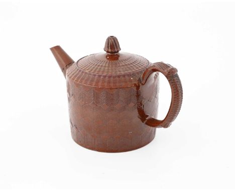 A Staffordshire Redware teapot, circa 1760, pseudo Chinese seal mark, cylindrical drum form tooled with combed geometric desi