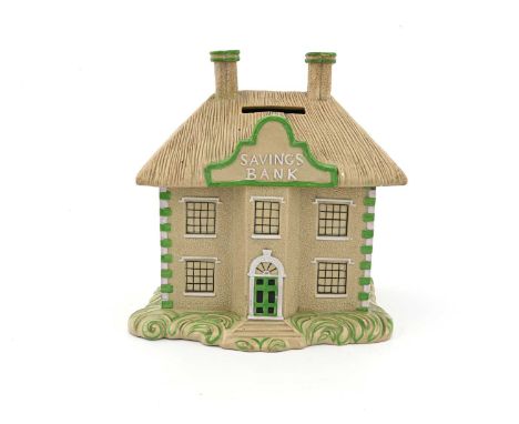 A Staffordshire drabware house moneybox, circa 1820, modelled as a Savings Bank building with thatched roof, green and white 