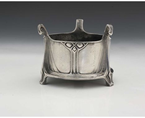 Albin Muller for WMF, a Jugendstil silver plated bottle coaster, cylindrical form with three relief moulded Viking dragon boa