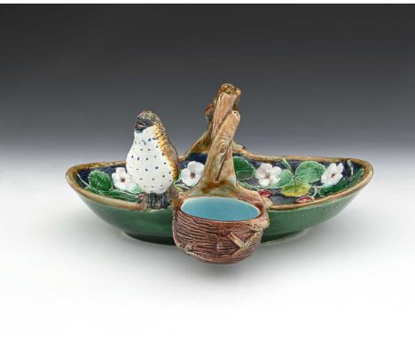 A Holdcroft majolica strawberry dish, modelled in relief as a basket with flowering and fruiting strawberry plant, twisted br