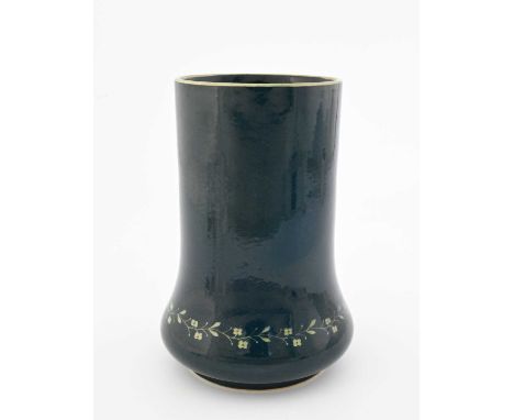 Ruskin Pottery, a Souffle glazed vine painted vase, 1915, elephant foot bulbous form, blue ground ith a band of flowering ten