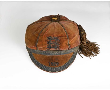 Stanley Matthews, an England International Schoolboys football cap, 1929, red velvet with gold thread tassel, embroidered dat