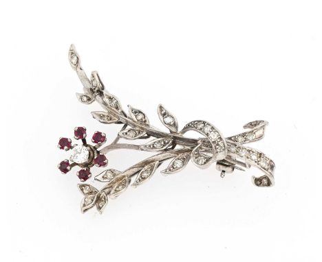 A mid 20th century white metal circular-cut diamond and ruby floral spray brooch, estimated total diamond weight 0.60ct, leng