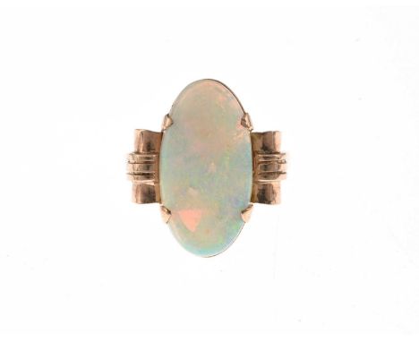 A 1940s gold opal cabochon single-stone dress ring, opal measures approximately 21.3 by 11.2 by 3.8mm, ring size P, 5gOverall