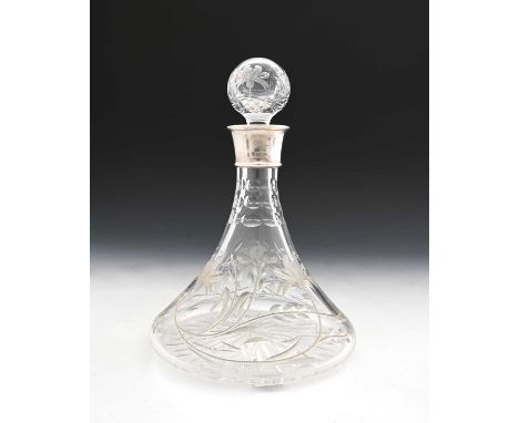 An Elizabeth II silver-mounted cut glass ships decanter, sponsor's mark 'BSE&amp;Co.', Birmingham 1991, cut and etched with f